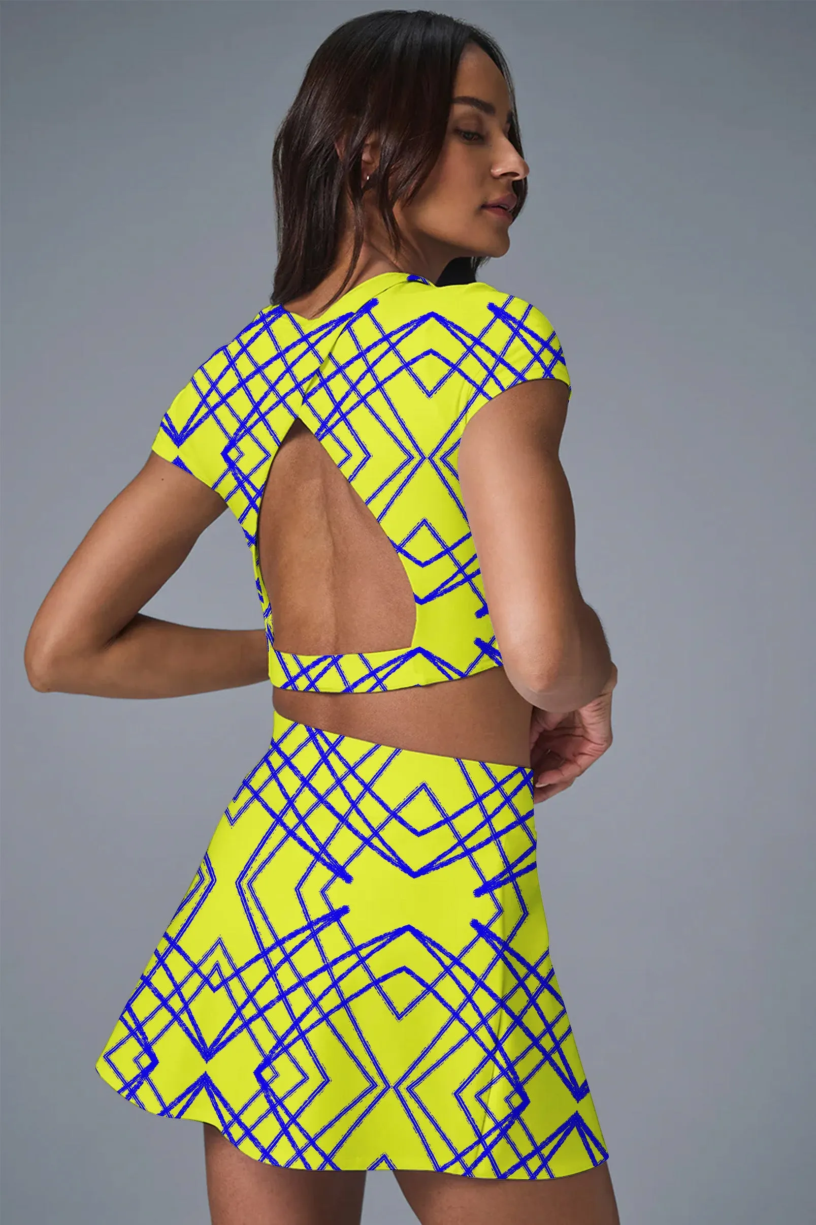 GeoGlow Set – Neon Yellow Grid Pattern Crop Top & Active Skort for Women