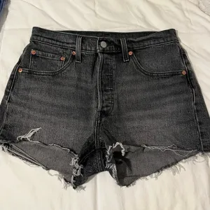 Levi’s 501 Black Distressed Shorts