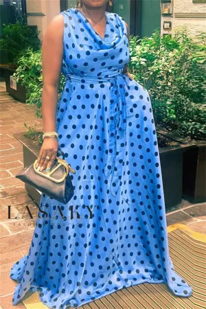 Ortega - Blue polka dot dress with vintage belt.